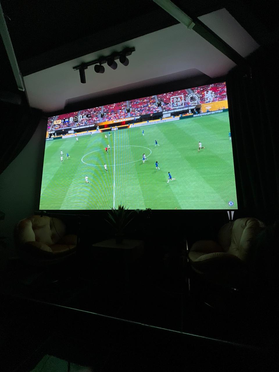 Children playing video games in a gaming zone